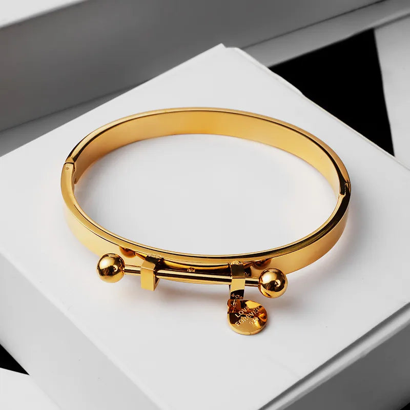 Brazalete_Themis_sobre_caja-blanca.jpg