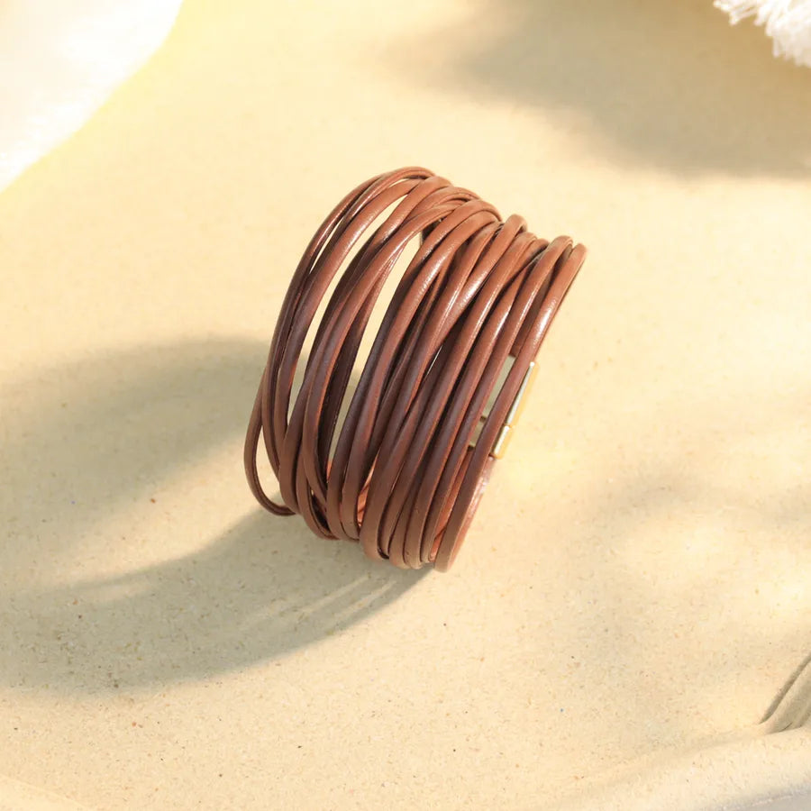 pulsera-cyra-caoba-tomafrontal.jpg