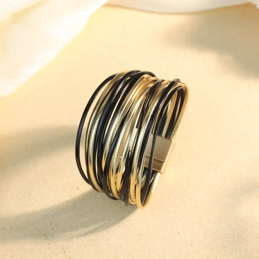 pulsera-cyra-onyxdorado-tomafrontal.jpg